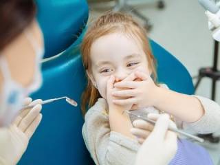 Существует ли в Казахстане качественное лечение зубов по ОСМС?