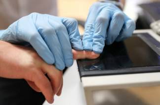 У казахстанцев будут снимать отпечатки пальцев при получении документов